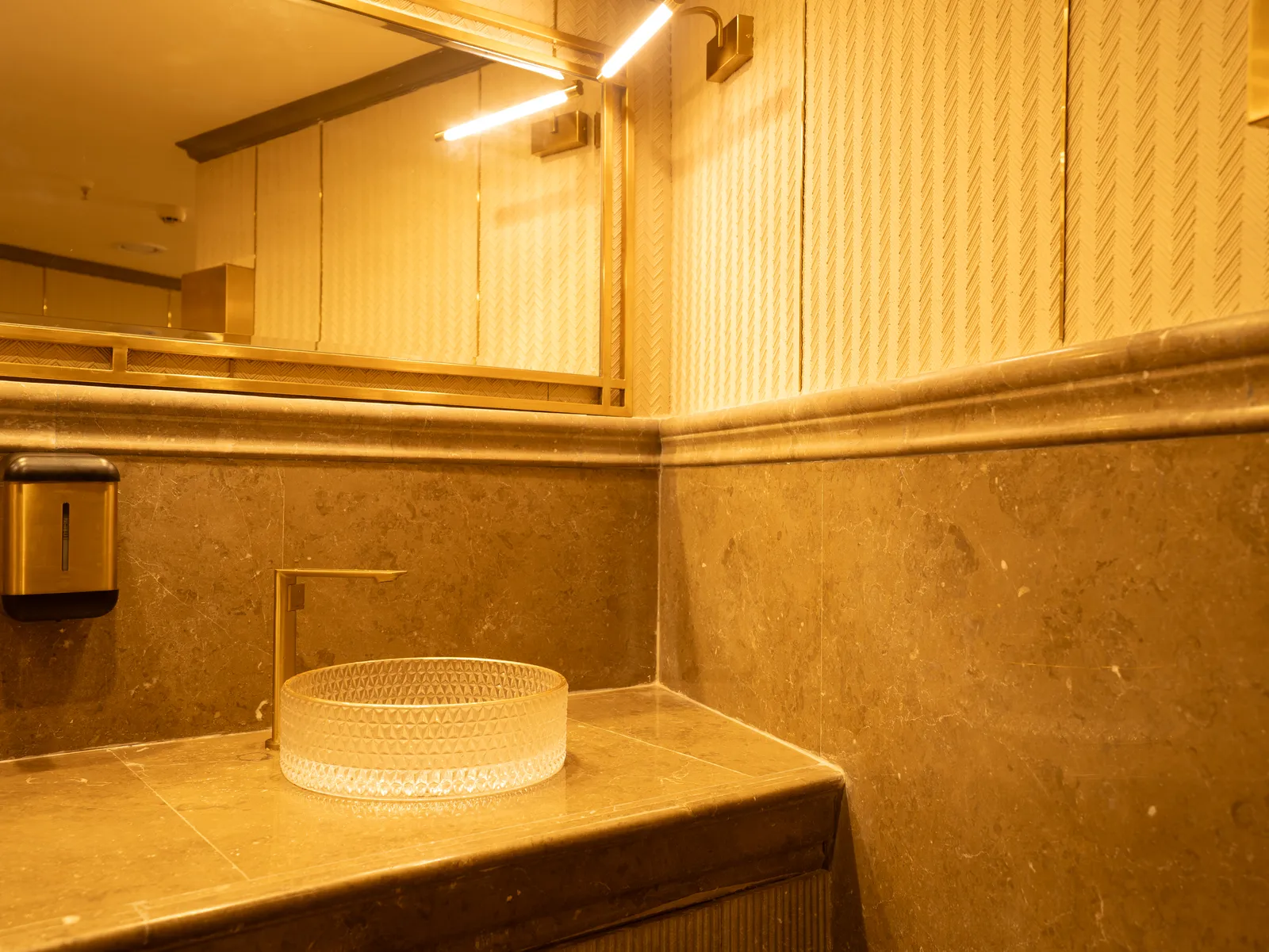 Washroom basin with stone cladding — Chalukya Samrat